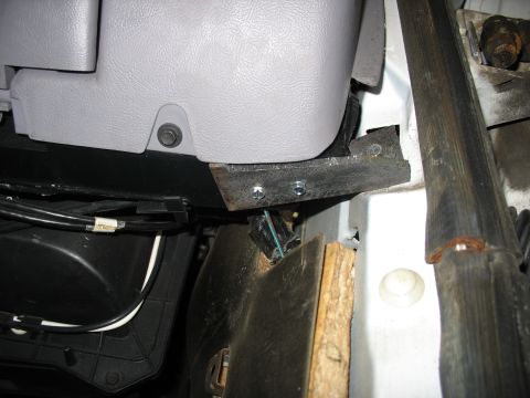 1995 Ford C-350 (Centurion Conversions) - Close-up view of the interior of a vehicle, showing dashboard components and wiring.
