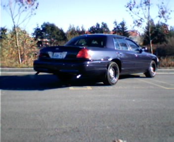 2001 Ford Crown Victoria - This 2001 Ford Crown Victoria is seen from the rear three-quarter angle.