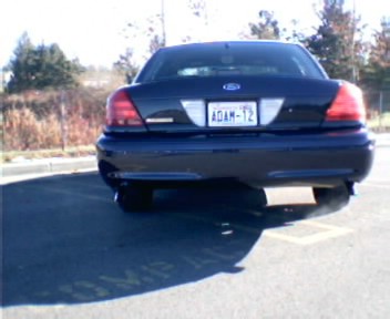 2001 Ford Crown Victoria - Rear view of a 2001 Ford Crown Victoria parked outdoors.