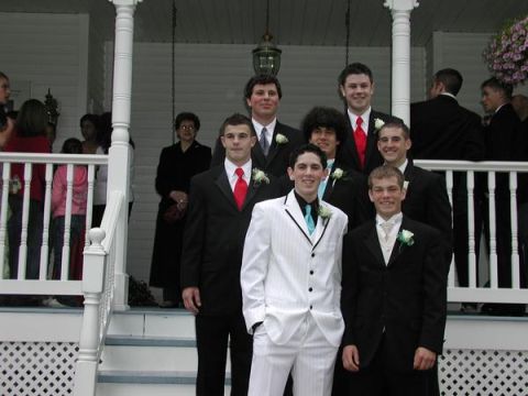 1996 Ford Bronco - A group of young men dressed in formal attire pose for a photo on the steps of a white house.
