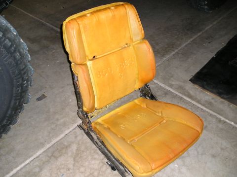 1986 Toyota Hilux - This is a close-up of a disassembled car seat, showing the foam padding and metal frame.