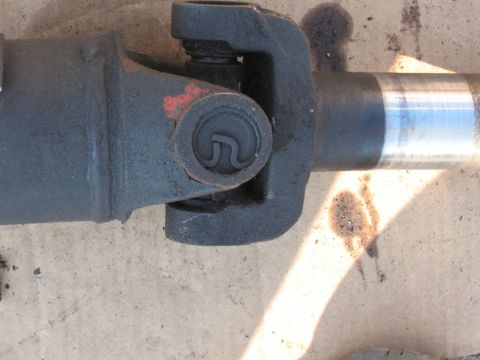 1968 Shelby GT500 - This photo shows a close-up of a vehicle's driveshaft U-joint, not a rear suspension detail.