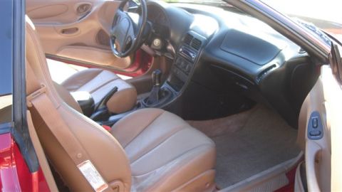 1996 Ford Probe - Interior view of a 1996 Ford Probe, showing the seats, dashboard, and center console.