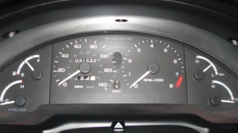 1996 Ford Probe - Dashboard gauges including speedometer, tachometer, and fuel level indicator.