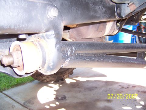 1994 Ford Bronco - A close-up view of a vehicle's undercarriage suspension system, with a tire and concrete visible below. The image is dated 07/20/2007.