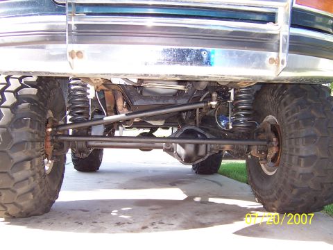 1994 Ford Bronco - Undercarriage view shows heavy-duty suspension and steering components on a 4x4.