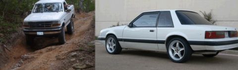1991 Ford Mustang - A white 1991 Ford Mustang coupe is shown parked, with a white pickup truck driving on a dirt road in the background.