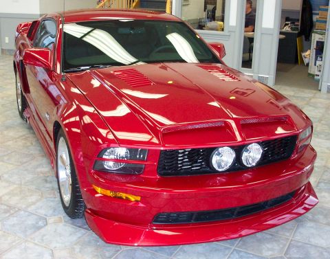 2008 Ford Mustang - Red Ford Mustang from the front, model years 2005-2009.