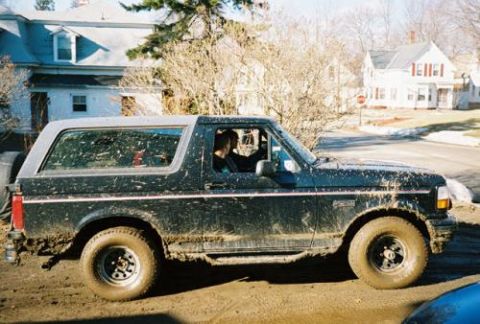 1995 Ford Bronco - This 1995 Ford Bronco is covered in mud after being driven off-road.