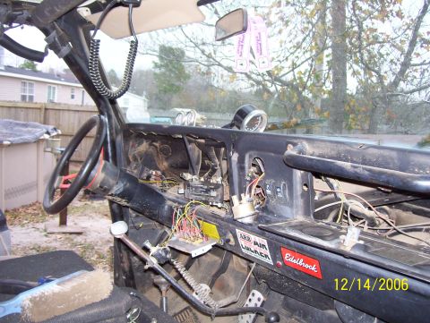 1978 Ford Bronco - Dashboard wiring and components are visible in this interior shot of a vehicle.