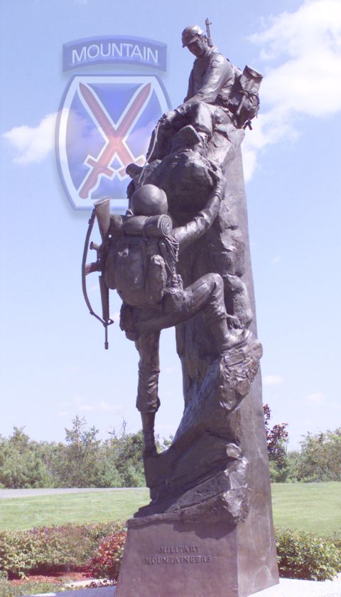 2002 Ford Crown Victoria - A statue depicting soldiers climbing, with the 10th Mountain Division logo visible in the background.