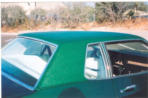 1975 Ford Mustang - NOS emerald green vinyl top