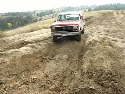 1986 Ford Bronco - dropping into a hole