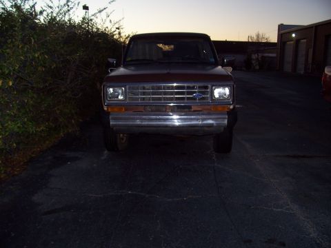 1984 Ford Bronco II - Front view of a 1984 Ford Bronco II parked outdoors at dusk.