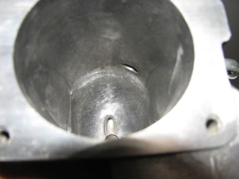 2003 Ford Crown Victoria - Interior view of a throttle body, showing the bore and internal components.