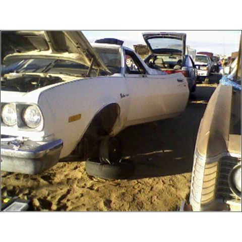1973 Ford Ranchero - Junkyard find: a 1973 Ford Ranchero with its hood and trunk open, missing a front wheel.