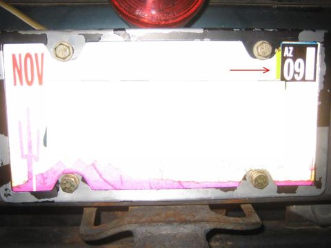 1994 Ford Bronco - The license plate frame shows a NOV sticker and an AZ 09 sticker, indicating the registration expires in November 2009.