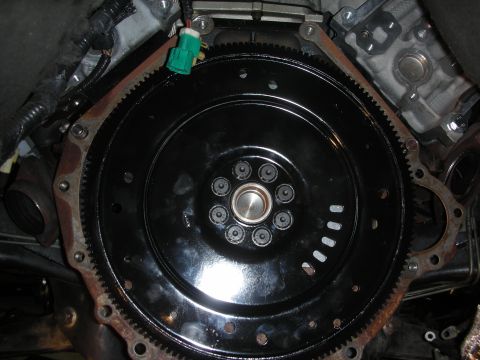 1992 Ford Crown Victoria - Close-up view of a vehicle's transmission flywheel, showing its mechanical components.