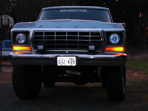 1978 Ford Bronco - This lifted 1978 Ford Bronco is shown from the front, its grille and headlights.