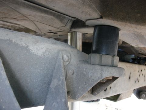 1978 Ford Bronco - Close-up view of a body lift kit installed on a 1978 Ford Bronco, allowing clearance for large tires.