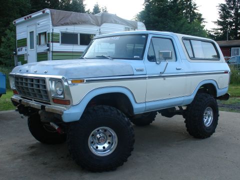 1978 Ford Bronco - This lifted 1978 Ford Bronco is equipped with substantial off-road tires, suggesting it's ready for challenging terrain.