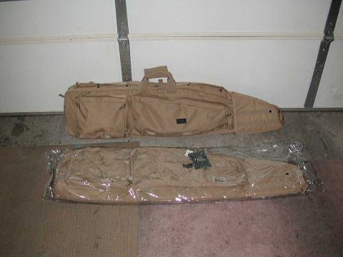 1991 Ford Bronco - Two tan rifle cases are shown, one is still in its original plastic packaging.