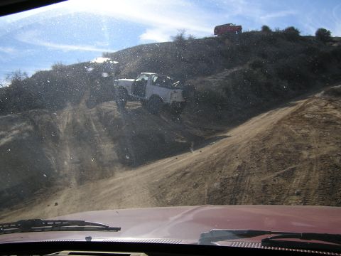 1990 Ford Bronco - 3 Broncos Climbing (dirty windshield)