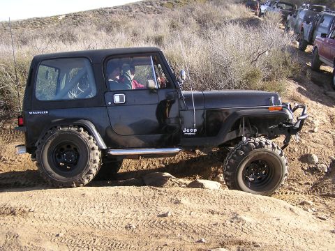 1990 Ford Bronco - Black Jeep in Ditch