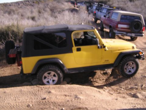 1990 Ford Bronco - Yellow Jeep (Blurry)