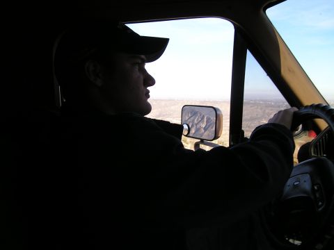 1990 Ford Bronco - Adam Driving the Bronco, good reflection in driver mirror