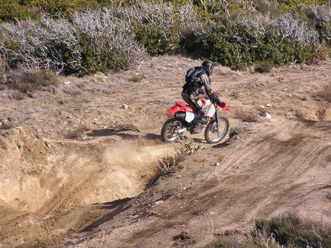 1990 Ford Bronco - Dirt biker in the action