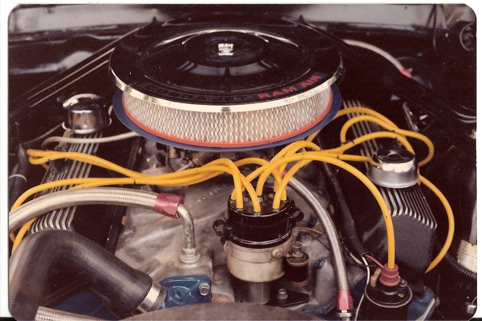 Ford Cobra Jet Ram Air air cleaner assembly on an engine with yellow spark plug wires