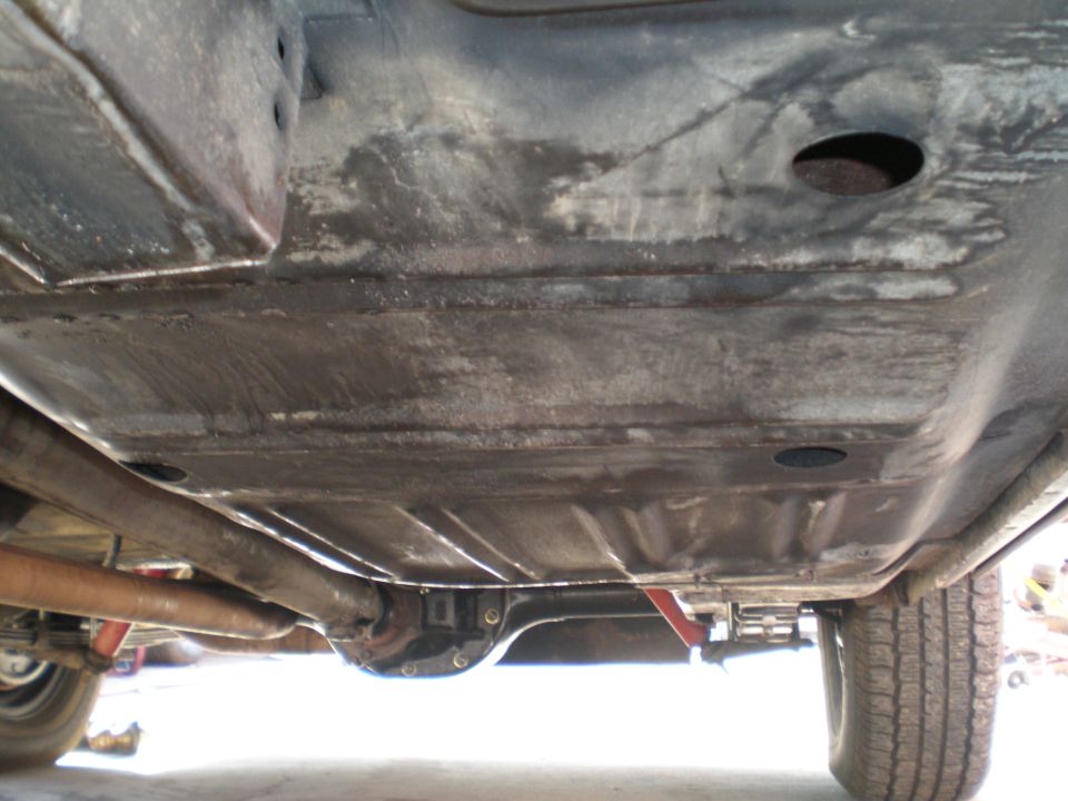 1966 Ford Mustang underbody showing frame rails, exhaust, and rear differential