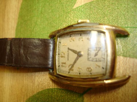 1994 Ford Bronco - Close-up of a vintage Hamilton wristwatch with a leather strap.