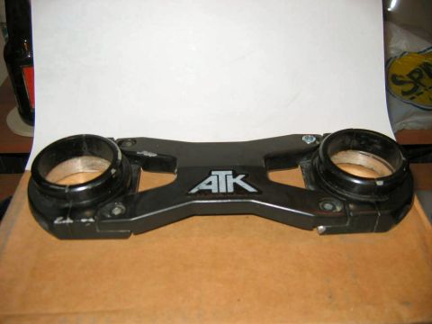 1985 Ford LTD Crown Victoria - ATK triple clamp for sale. Part number visible on left side.