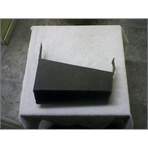 1972 Ford Ranchero - A single black plastic component is displayed on a white cloth, with a portion of a box visible in the background.