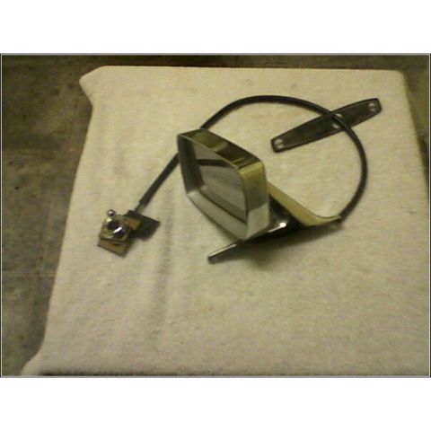 1972 Ford Ranchero - A car side mirror part is shown, detached from a vehicle, on a white cloth surface.