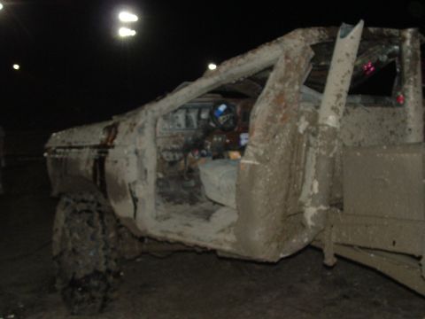 1992 Ford F-350 - Mud-caked truck interior, doors open, at night.