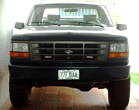 1995 Ford F-150 - Front view of a 1995 Ford F-150 truck, showing the grille and headlights.