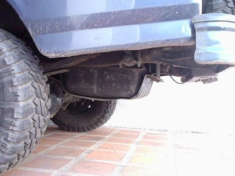 1995 Ford F-150 - Underside view of a 1995 Ford F-150 showing the fuel tank and suspension components.