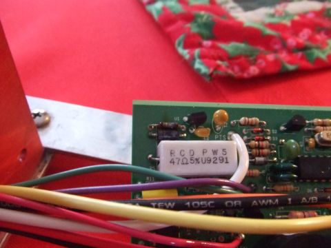 1995 Ford Mustang - A circuit board with various electronic components and colorful wires is shown in detail.