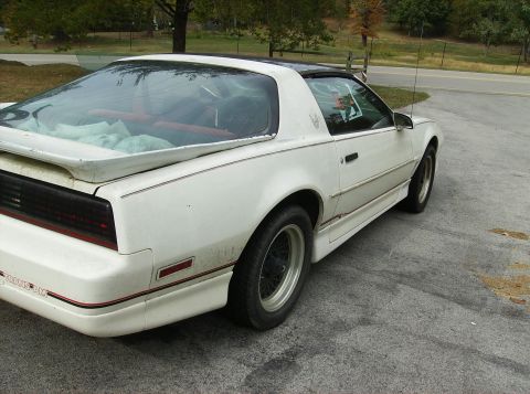 1995 Ford Probe - This third-generation Pontiac Firebird Trans Am is shown from the rear-three-quarter angle.