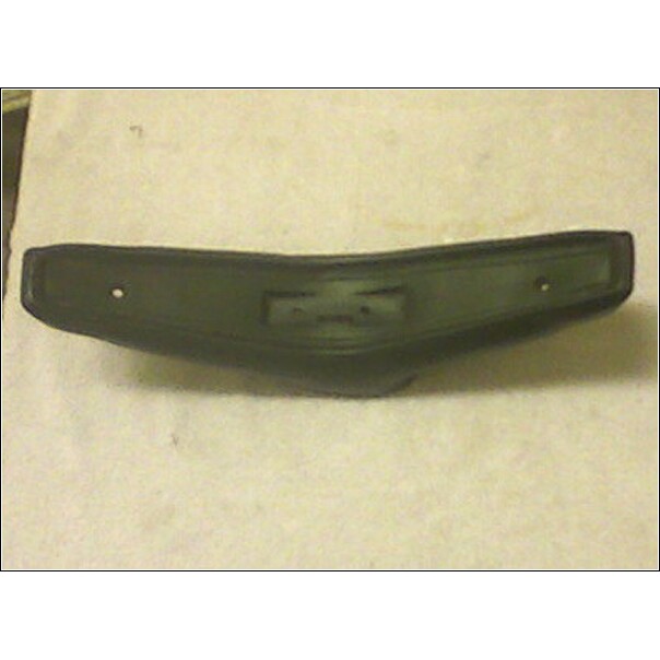 Dark grille emblem with rectangular cutout and two mounting holes