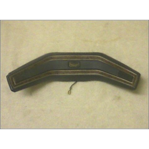 1972 Ford Ranchero - This dark dashboard trim piece features gold accents and a dangling wire, likely from an older vehicle.