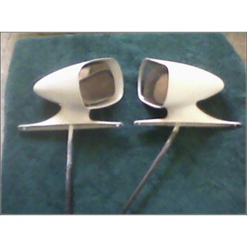 1972 Ford Ranchero - Two white side mirrors with chrome stems are displayed against a dark green background.