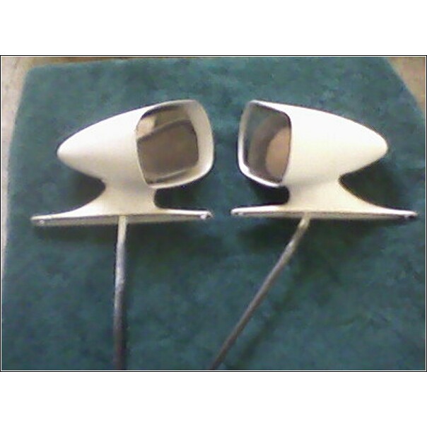 Pair of white, bullet-shaped side mirrors with chrome stems, shown from the front