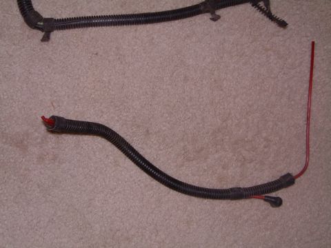1992 Ford Bronco - alas...on the left there are 2 red lines and the other end one terminates in a neat little connector