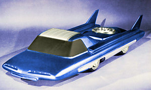 1972 Ford Ranchero - A futuristic concept car with a distinctive finned design and a metallic blue finish.