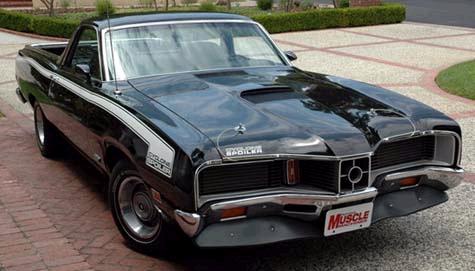 1972 Ford Ranchero - This black Ford Ranchero features a distinctive grille and hood scoop, indicative of a 1970 model year.