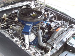 1972 Ford Ranchero - Detailed view of the engine compartment in a 1972 Ford Ranchero, highlighting the V8 engine components.